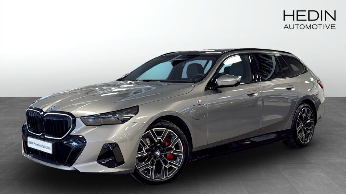 e xDrive Touring M Sport Pro Business Pano Drag Komfortstol