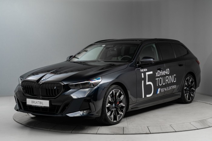 Touring xDrive40 Fully Charged Premium E (K)