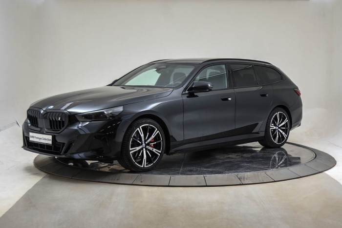 Touring xDrive40 Fully Charged Premium E (K)