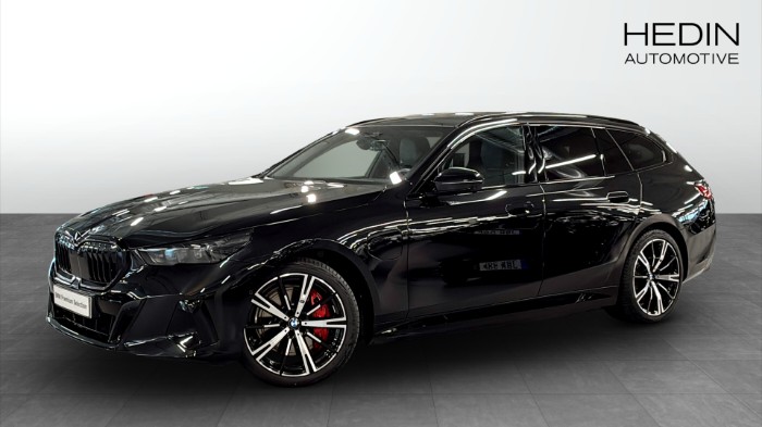e xDrive Touring M-sport Pro Business Panorama Head-up Drag