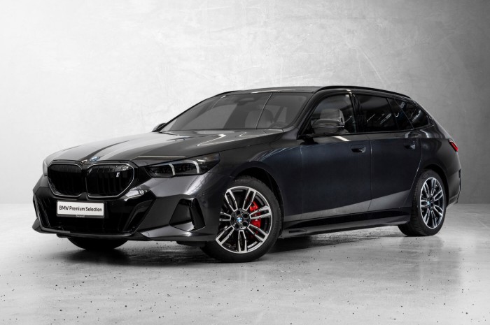Touring xDrive40 Fully Charged Premium E (K)