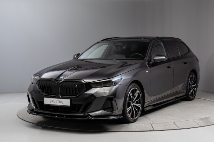 Touring xDrive40 Fully Charged Premium E (K)