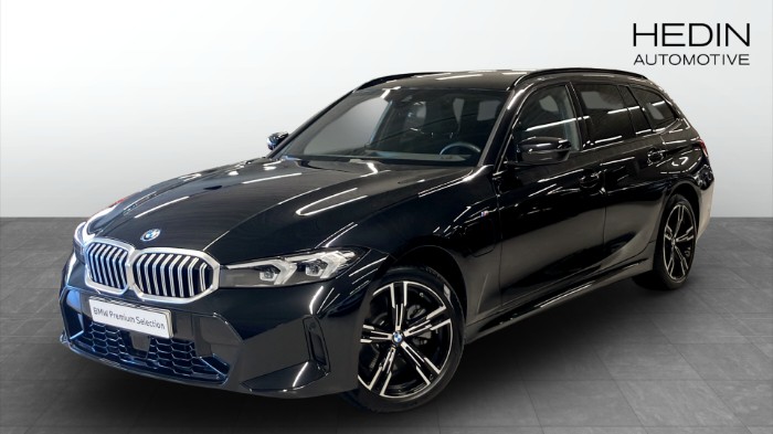 330E XDRIVE TOURING