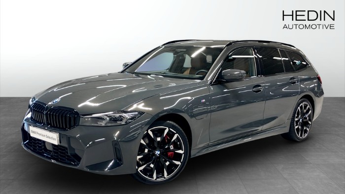 330E XDRIVE TOURING