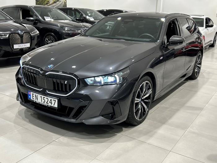 Touring xDrive40 Fully Charged Premium E (K)