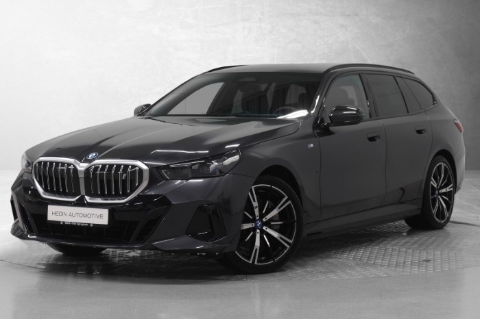 Touring xDrive40 Fully Charged Premium E (K)