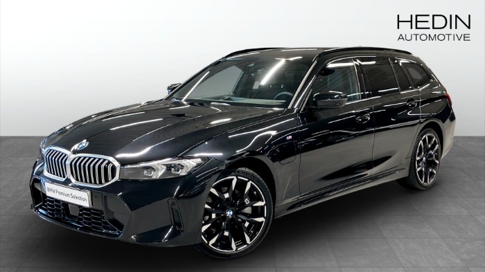 330E XDRIVE TOURING