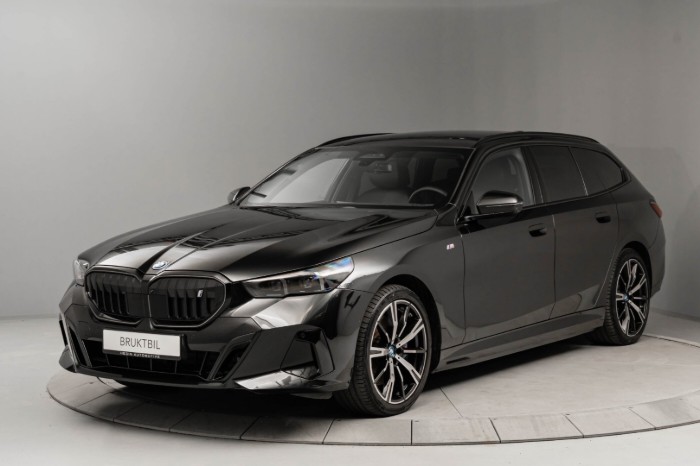 Touring xDrive40 Fully Charged Premium E (K)