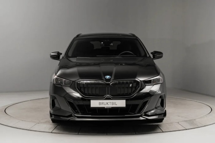 Touring xDrive40 Fully Charged Premium E (K)